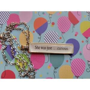 She Was Just Curious pendant necklace made from The Kiss Curse book pages